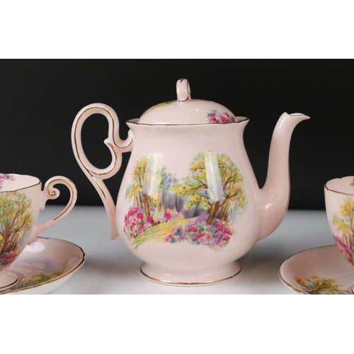 19 - Shelley Tea for Two in the England Charm pattern on a pink ground, comprising Tea Pot, Two Tea Cups,... 