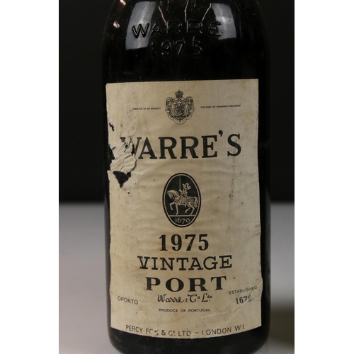 445 - Two bottles of vintage port to include Cockburns 1960 and Warre's 1975 examples.