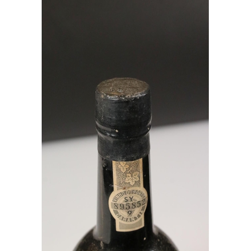 445 - Two bottles of vintage port to include Cockburns 1960 and Warre's 1975 examples.