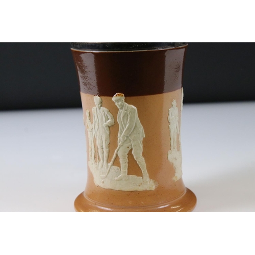 75 - Golf interest - Royal Doulton Salt-glazed Stoneware Tankard with moulded decoration of Golfers, impr... 