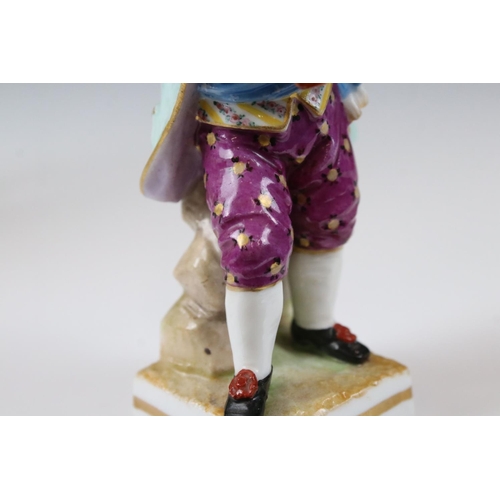 8 - Continental Porcelain Figure of a Boy playing a Musical Instrument, Meissen style blue cross swords ... 