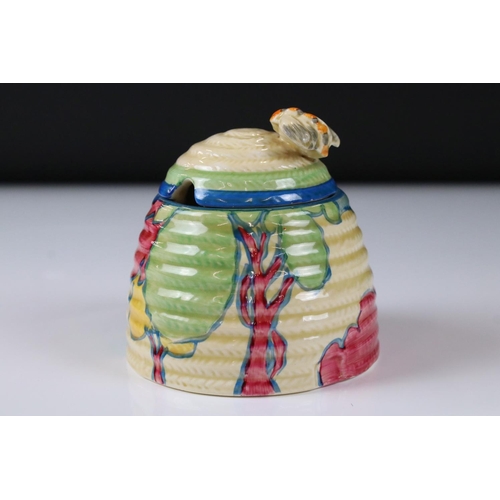 84 - Clarice Cliff Fantasque Bizarre Beehive Honey Pot decorated in the Blue Autumn pattern, 10cm high