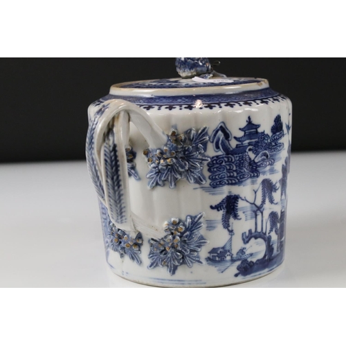 9 - Chinese Export Blue and White Teapot with twisted handle and white metal spout, 15cm high together w... 