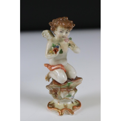 94 - Chelsea style Porcelain Figure Group of a Couple playing draughts, gold anchor mark to base, 16cm hi... 