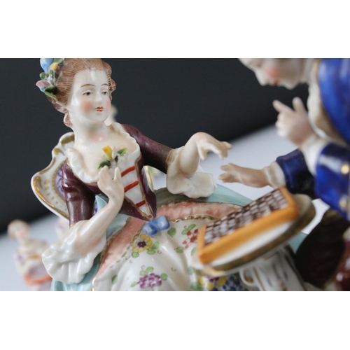 94 - Chelsea style Porcelain Figure Group of a Couple playing draughts, gold anchor mark to base, 16cm hi... 