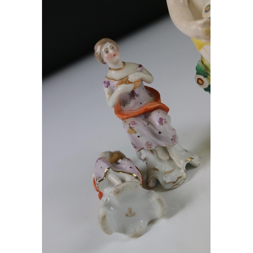 94 - Chelsea style Porcelain Figure Group of a Couple playing draughts, gold anchor mark to base, 16cm hi... 