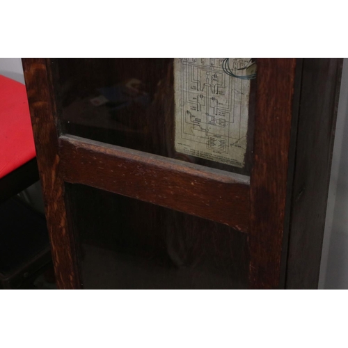 131A - PO36 Post Office Master Clock within an Oak Glazed Case, with pendulum and accessories including key... 