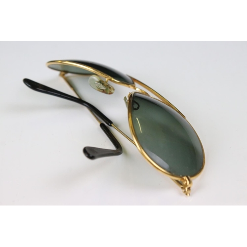 192 - A pair of vintage aviator style sunglasses complete with case.