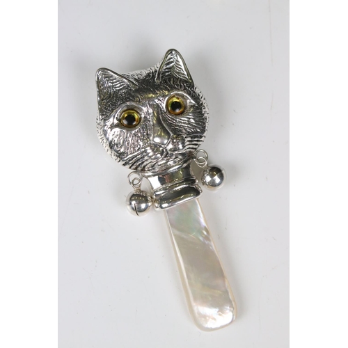 195 - Silver Louis Wain style baby's rattle with mother-of-pearl handle