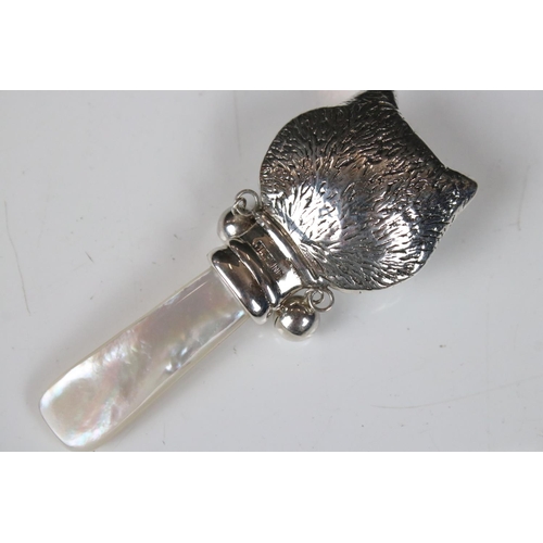 195 - Silver Louis Wain style baby's rattle with mother-of-pearl handle