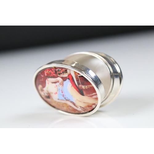 196 - Silver oval shaped pillbox with semi-nude enamel panel