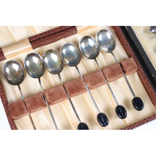 206 - A cased set of six fully hallmarked sterling silver coffee bean spoons together with a set of hallma... 