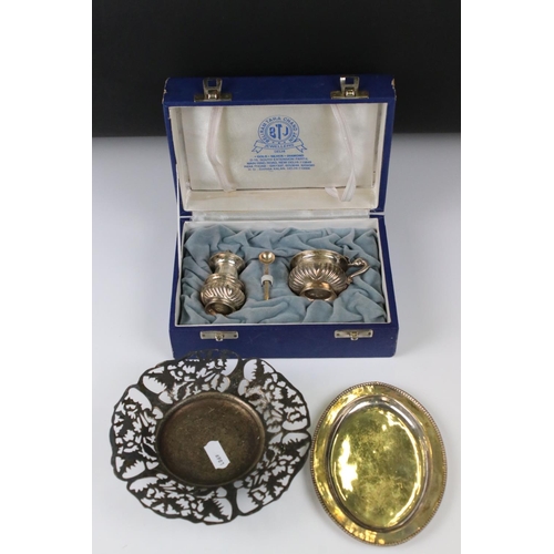 208 - A cased sterling silver cruet set together with a silver plated tray and dish.