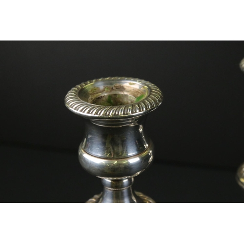 213 - Pair of Silver Plated Candlesticks in the Georgian manner, 22cm high