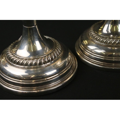 213 - Pair of Silver Plated Candlesticks in the Georgian manner, 22cm high