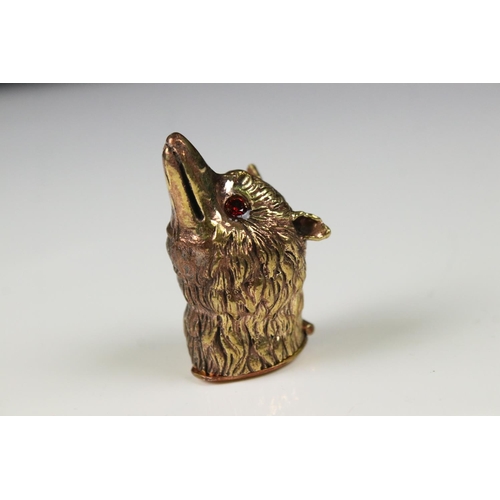 219 - Brass Vesta Case in the form of a Fox's Head with red eyes, 5cm high