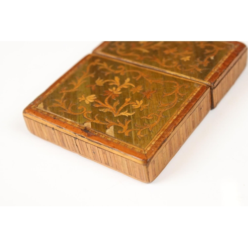 222 - A faux tortoiseshell cigar case with traditional Japanese decoration together with a straw work card... 