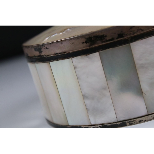 224 - A mother of pearl powder jar with white metal banding together with a similar lipstick holder.