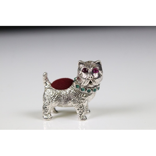 225 - Silver pincushion in the form of a dog with ruby eyes and emerald collar