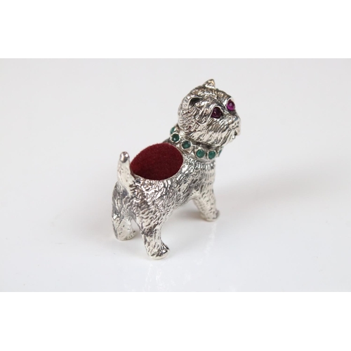 225 - Silver pincushion in the form of a dog with ruby eyes and emerald collar