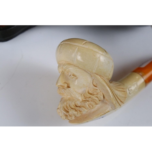 226 - Two meerschaum pipes, one cased with ornate silver decoration, lion's head front in lined case, the ... 