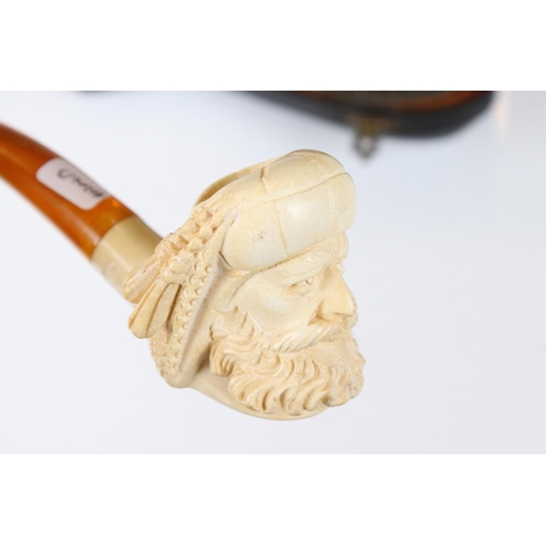 226 - Two meerschaum pipes, one cased with ornate silver decoration, lion's head front in lined case, the ... 