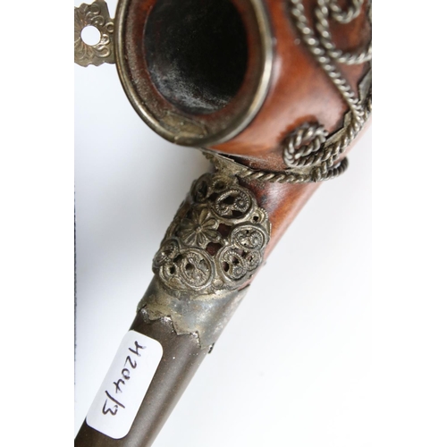 226 - Two meerschaum pipes, one cased with ornate silver decoration, lion's head front in lined case, the ... 