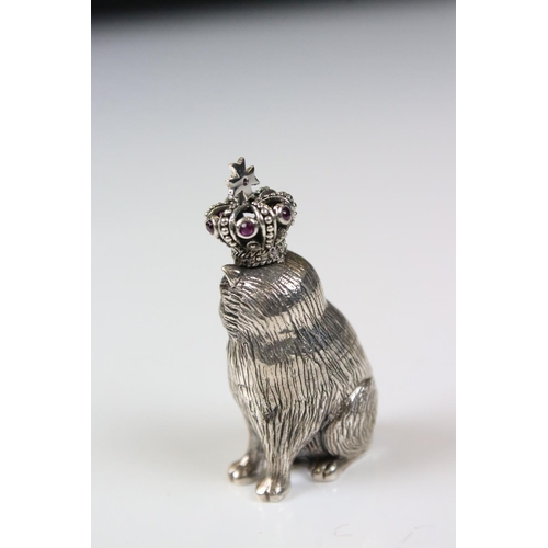 233 - Silver figure of a royal cat wearing a crown, inset with rubies