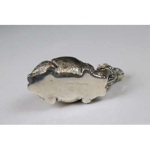 234 - Silver pincushion in the form of a camel with ruby eyes