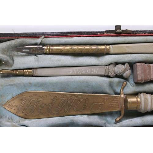 236 - A cased Grand Tour desk set to include letter opener, seal, pencil and pen.