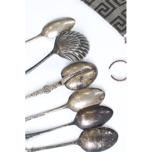 244 - A small group of silver collectables to include tea spoons, anointing spoon, hallmarked silver holde... 