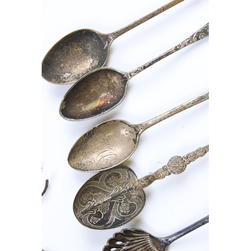 244 - A small group of silver collectables to include tea spoons, anointing spoon, hallmarked silver holde... 