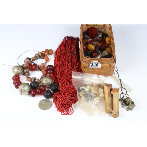 245 - A small collection of vintage ethnic / asian jewellery to include a coral beaded necklace.