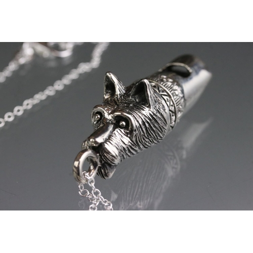 257 - Silver dog shaped whistle on a silver chain