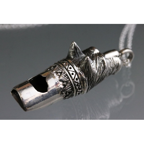 257 - Silver dog shaped whistle on a silver chain