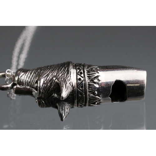 257 - Silver dog shaped whistle on a silver chain