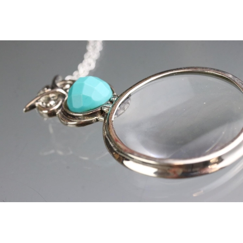 260 - Silver owl shaped magnifying pendant necklace with turquoise cabochon