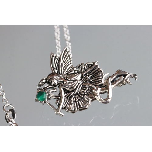 271 - Silver Art Nouveau style winged fairy pendant / brooch, with emerald cabochon