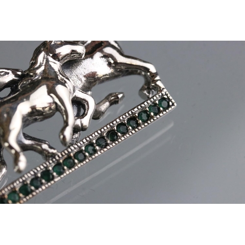 282 - Silver galloping horse pendant necklace on sapphire set platform