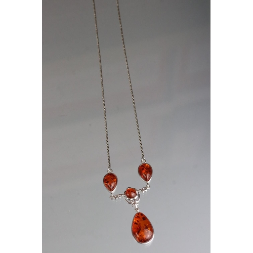 288 - Silver substantial amber necklace