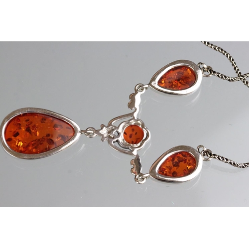 288 - Silver substantial amber necklace