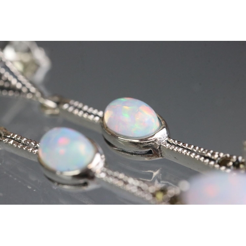 290 - Pair of silver and opal Art Deco style drop earrings