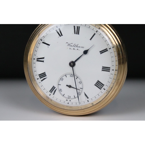 301 - A Waltham USA top winding pocket watch in gold plated case with sub second dial to 6 o'clock.