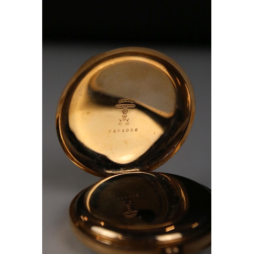 305 - An Elgin top winding pocket watch with gold plated case and sub second dial to 6 o'clock.