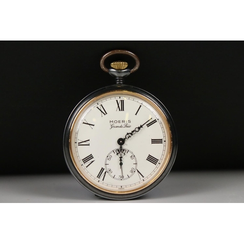 306 - A 'Moeris Grand Prix' top winding pocket watch with sub second dial to 6 o'clock.