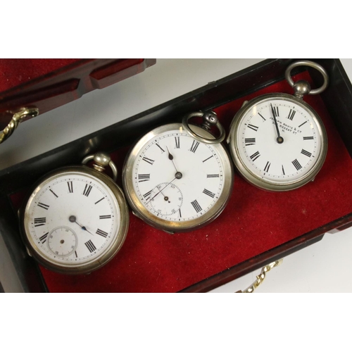 308 - A collection of approx nine pocket watches together with Albert chains and a pocket barometer contai... 