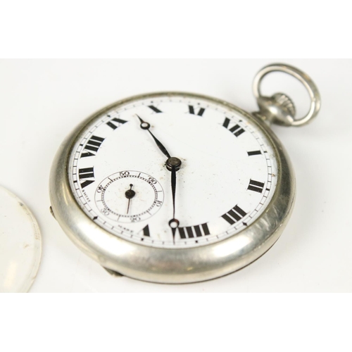 309 - A vintage top winding pocket watch in white metal case with sub second dial to 6 o'clock.