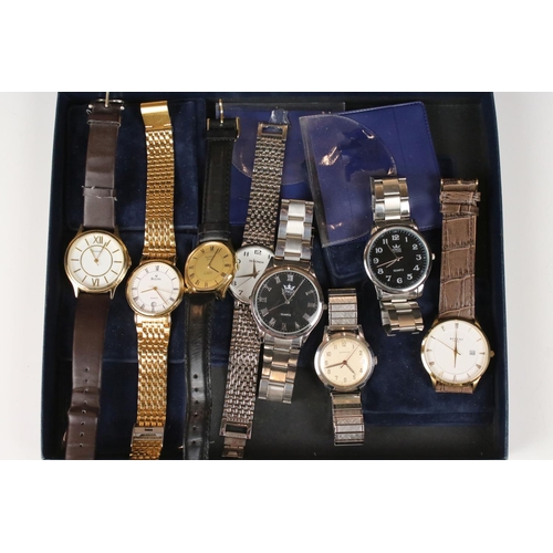 311 - A collection of eight gents wristwatches to include Bulova, Summit, Sekonda, Garrard and Regent exam... 