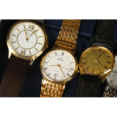 311 - A collection of eight gents wristwatches to include Bulova, Summit, Sekonda, Garrard and Regent exam... 