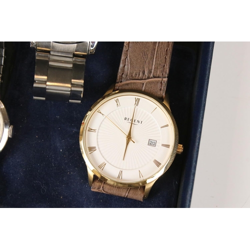 311 - A collection of eight gents wristwatches to include Bulova, Summit, Sekonda, Garrard and Regent exam... 